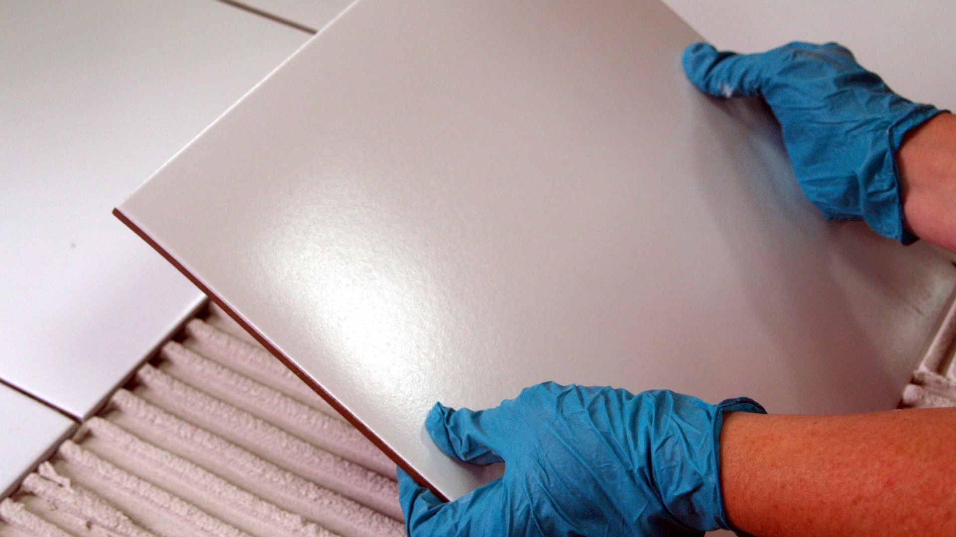 How to stop water leaking through bathroom and shower tiles